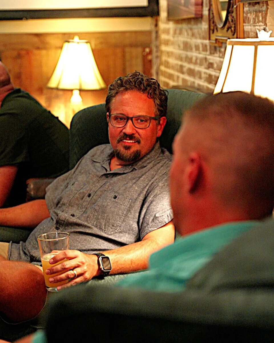 Dads catching up over drinks at Turning Point Beer